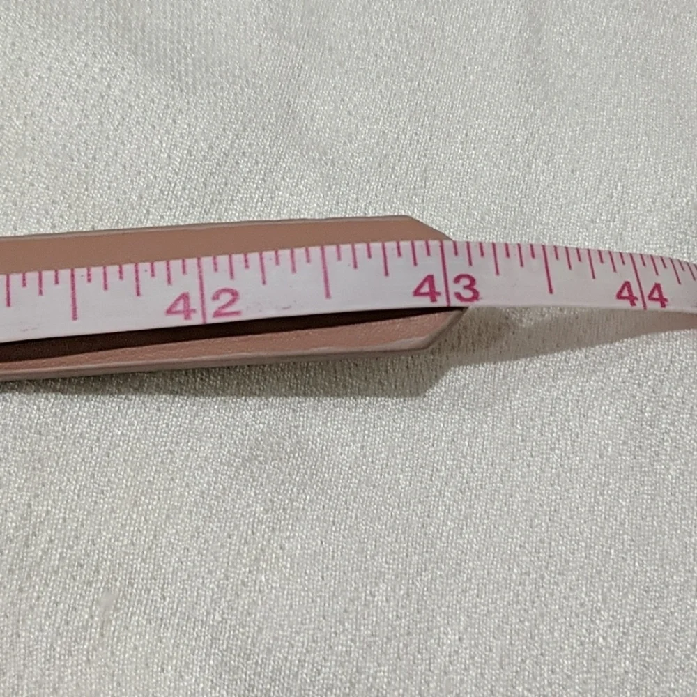 NWOT Pale Pink Skinny Belt